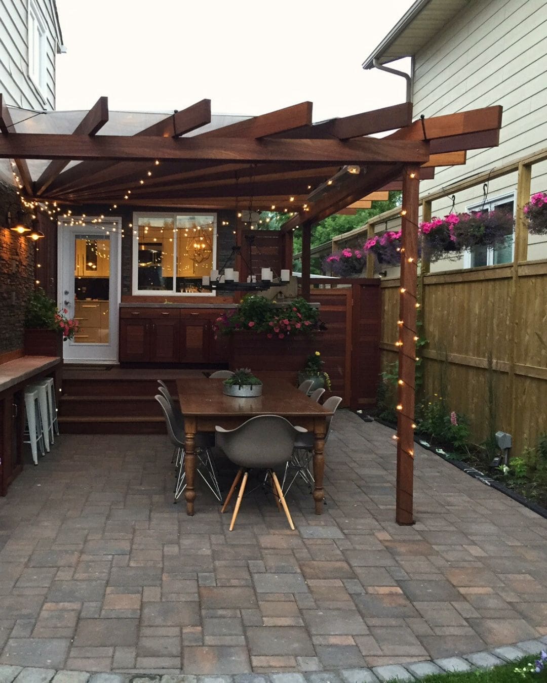 New Look Landscapes Calgary - Landscaping Design Ideas and Trends 2025 - Creating Outdoor Living Spaces with All-Season Functionality - Covered Pergola Dining Patio